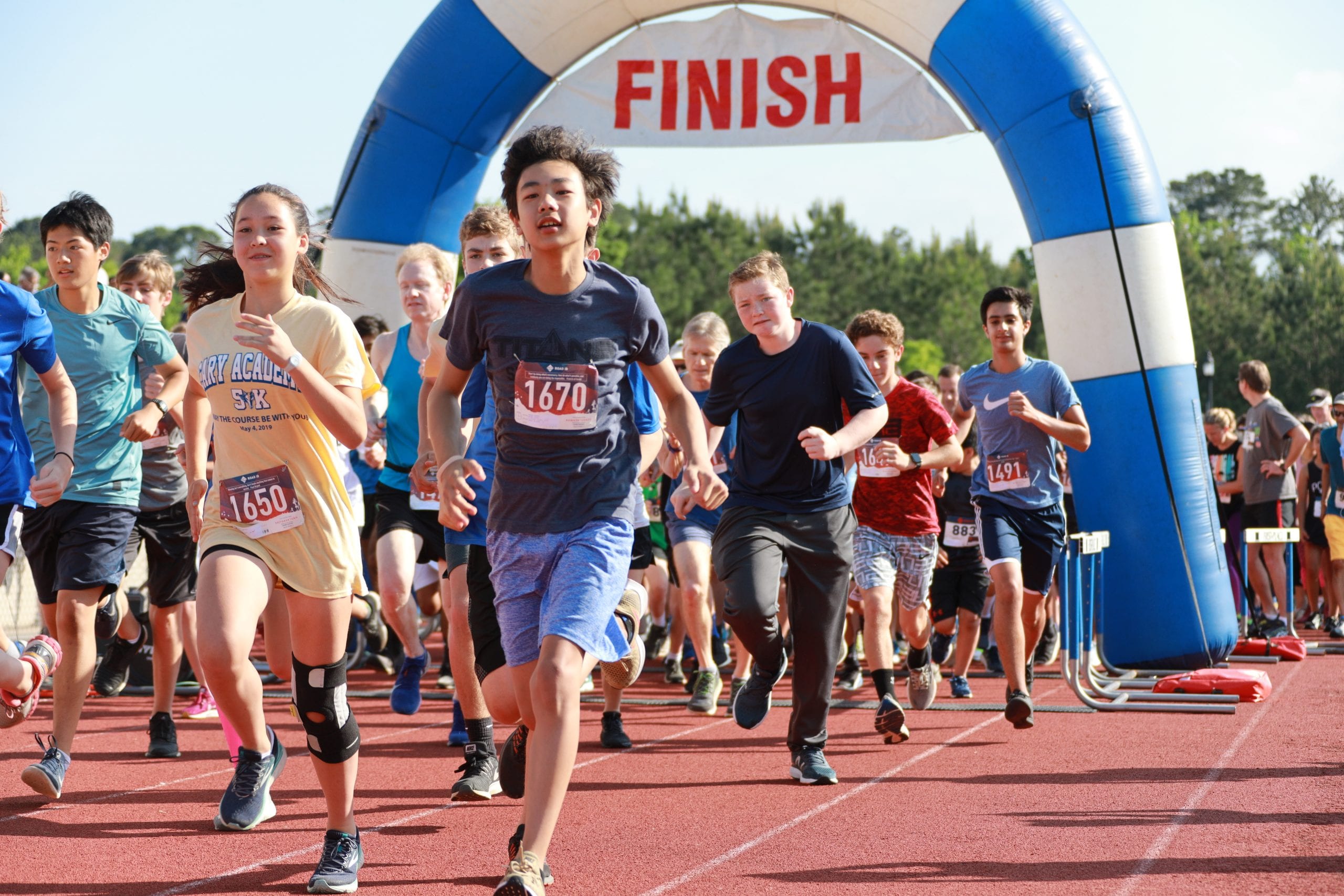 Cary Academy 5K run - students at the start finish line