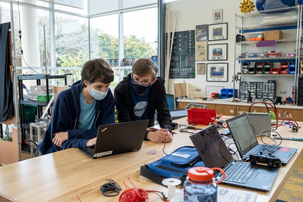 Masked students in the makerspace