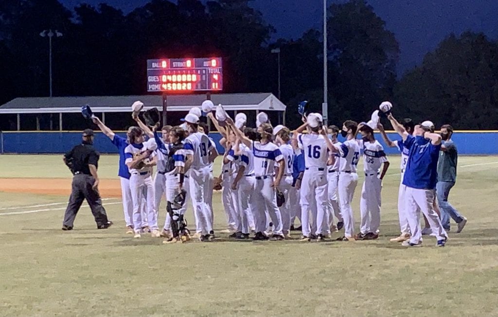 Varsity baseball celebrates the win