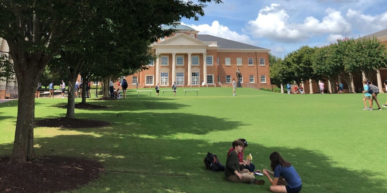 CA Students sitting on the Quad