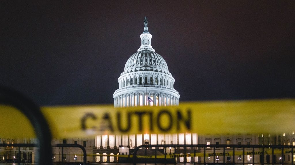 The U.S. Capitol behind caution tape