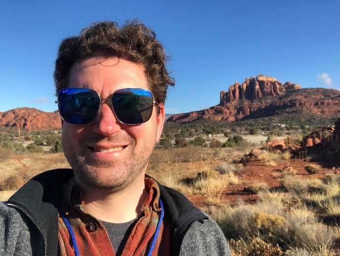 A person wearing sunglasses
Description automatically generated with low confidence